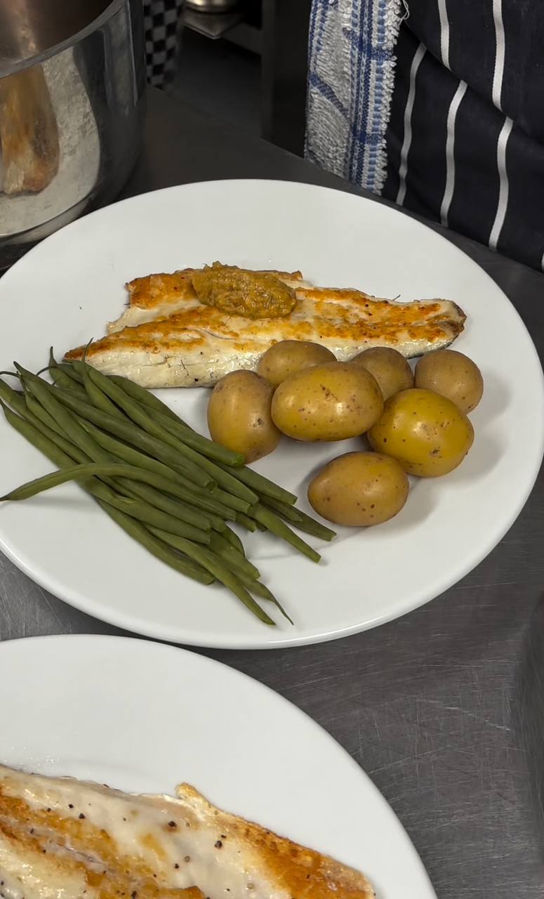 Pan-fried fish with new potatoes and green beans