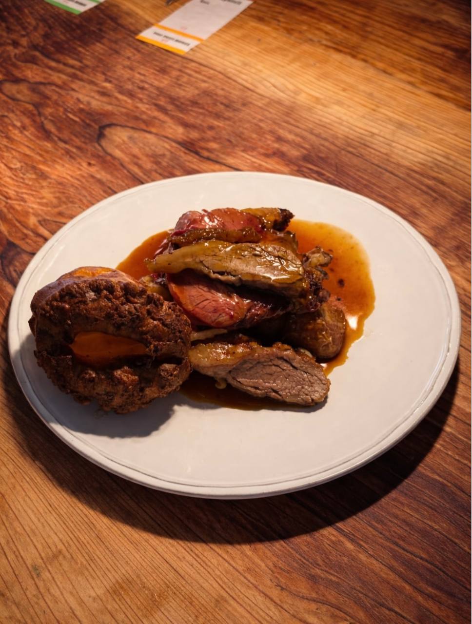 Roast lamb with Yorkshire pudding and seasonal vegetables