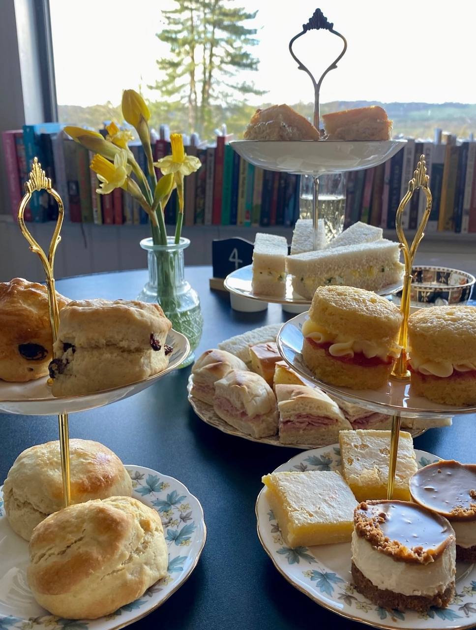 Afternoon tea with scones and cakes